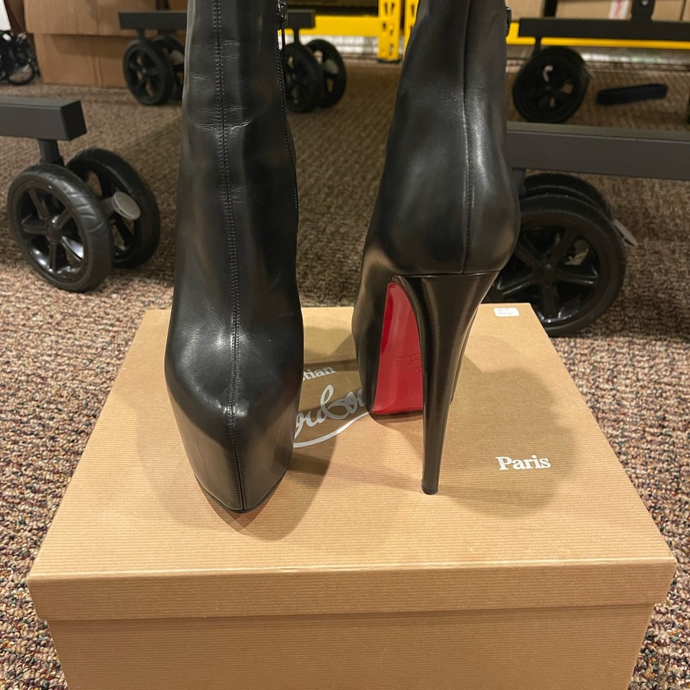 Christian Louboutin Black Heeled Boots with Red Soles